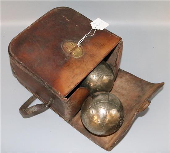 Leather cased French boules